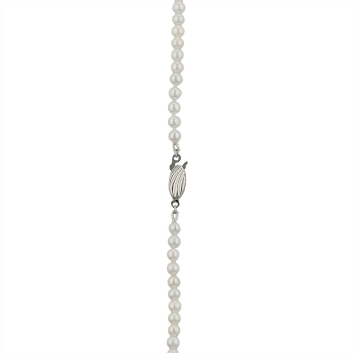 Close-up view highlighting the decorative sterling silver clasp and the uniform luster of the pearl strand. Item No. 224412