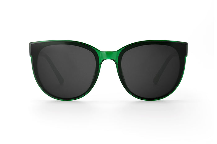 Front angle shot of the Carat Sunglasses: Cycad Green on a white background