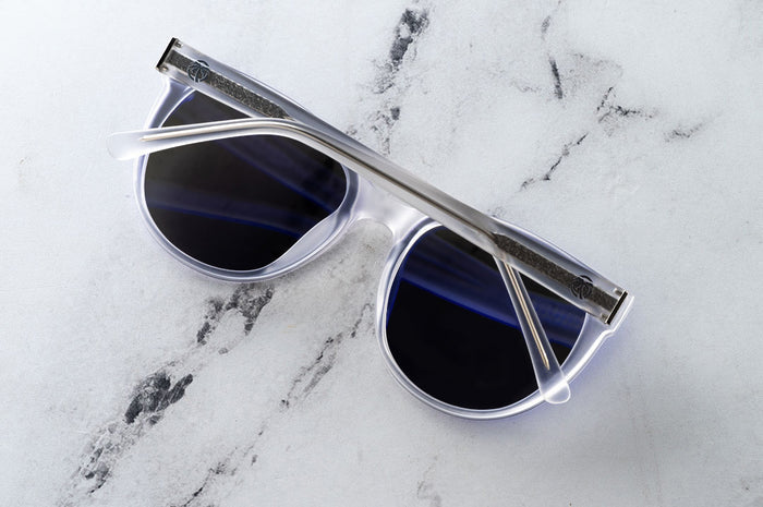 Close up of Heat Wave Carat with Vapor Frost Frame and Purple Lenses