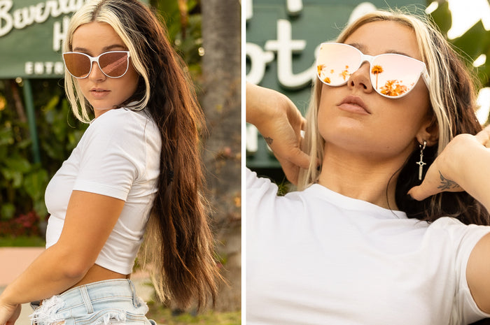 Women out in Beverly Hills wearing the Heat Wave Visual Womens Carat Sunglasses with white frame and rose gold lenses.