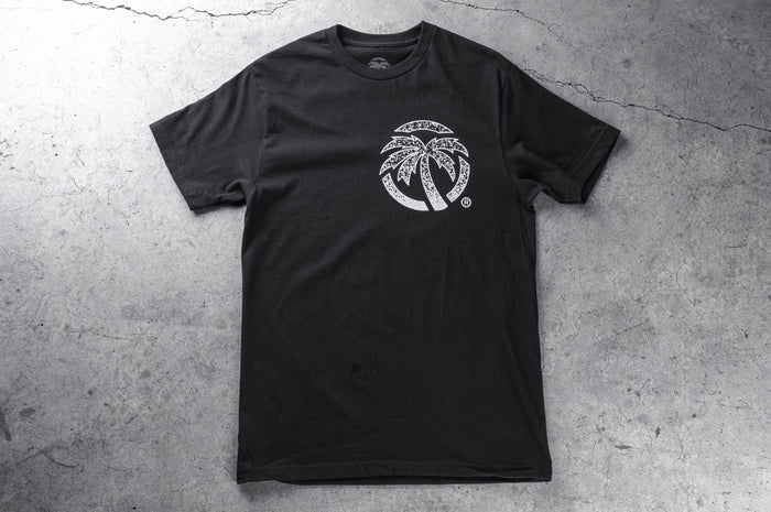 Frontside shot of the Heat Wave Alloy T-Shirt on a concrete floor.