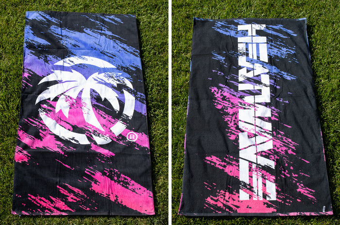 Heat Wave Baja Nights Towel front and back lying on the grass
