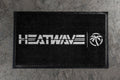 Heat Wave Visual Entryway Rug on a concrete floor.