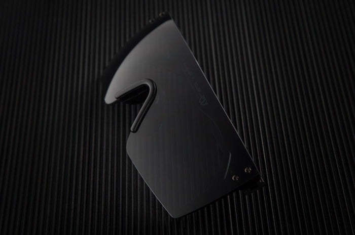 Heat Wave Visual Lazer Face Z87 Sunglasses with black frame and black lens on a black table.