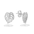 Side angle of 14k white gold monstera stud earrings highlighting dimensional leaf design. Item No. 43740