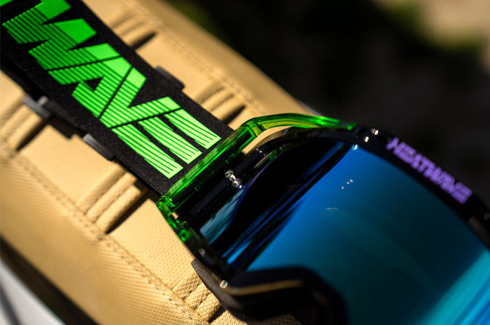 Heat Wave Visual MXG 250 Motorsport Goggle in the Hydro Digger color way with a Piff lens.
