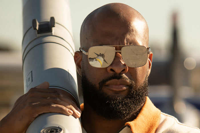 Ryan rocking the Heat Wave Visual Nimitz Sunglasses with gun metal frame and silver lenses.