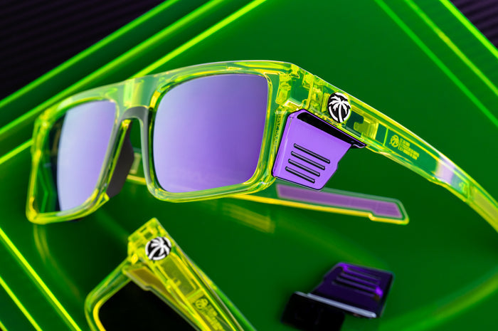 Close up shot of the Performance Rayth Sunglasses: Antifreeze Z87+ on a neon green platform