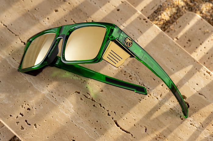 The Performance Rayth Sunglasses: Cycad Green Z87+ on concrete