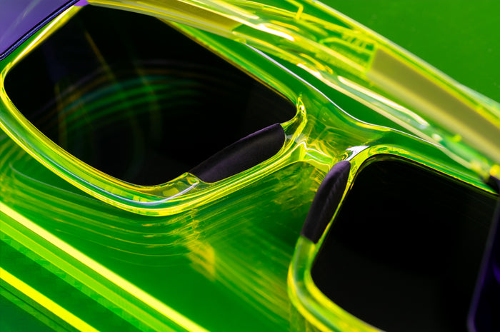 Backside close up shot of the Performance XL VISE Sunglasses Frame: Antifreeze Z87+ sitting on a neon green platform