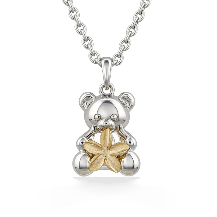 Sterling silver teddy bear holding a 14K yellwo gold plumeria pendant with chain. Item No. 45382