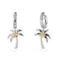 Palm trees dangling on hooplets, made in sterling silver with a 14k yellow gold plumeria in center of leaves. Item No. 44762