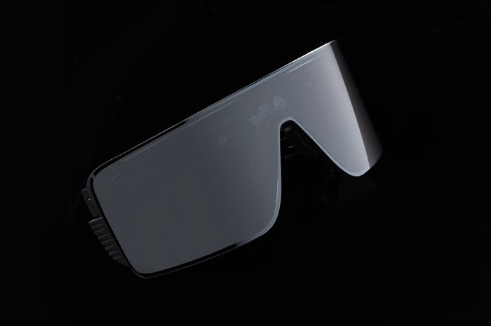 3/4 angle shot of the Skynet Sunglasses: Silver Z87+ on a black background