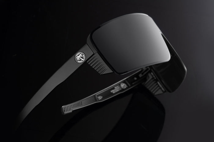 Side profile shot of the Skynet Sunglasses: Silver Z87+ on a black background
