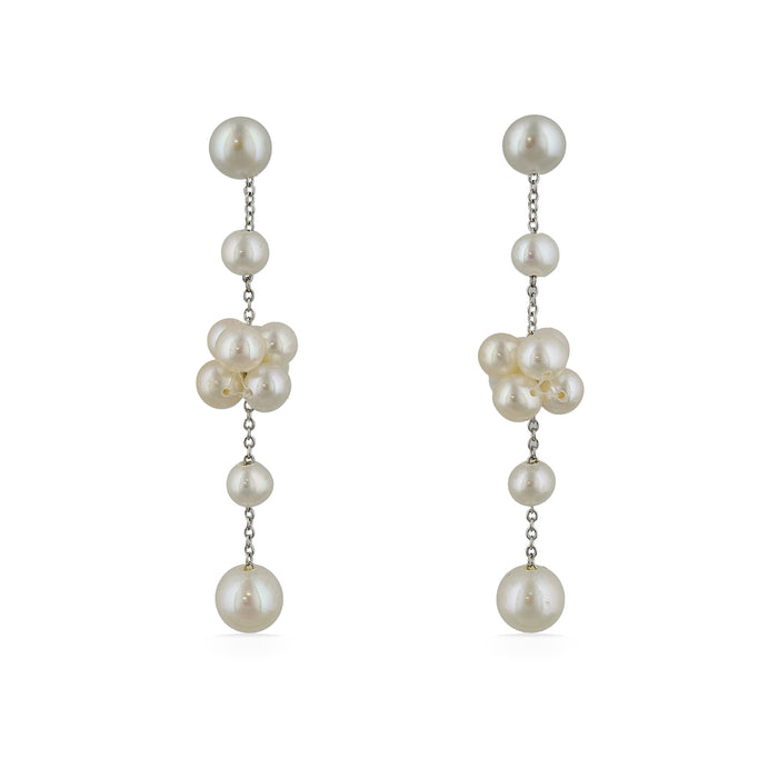 Front view of elegant freshwater pearl drop earrings with clusters of pearls suspended on fine silver chains. Item No. 700693