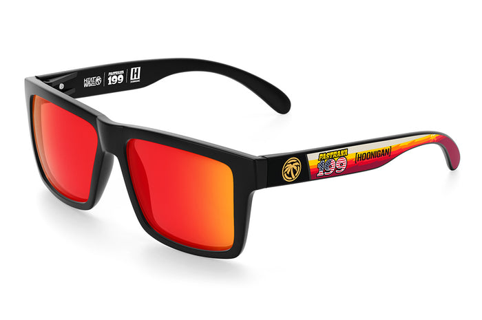 Heat Wave Visual Vise Sunglasses with black frame, Pastrana Hoonigan print arms and sunblast orange yellow lenses.