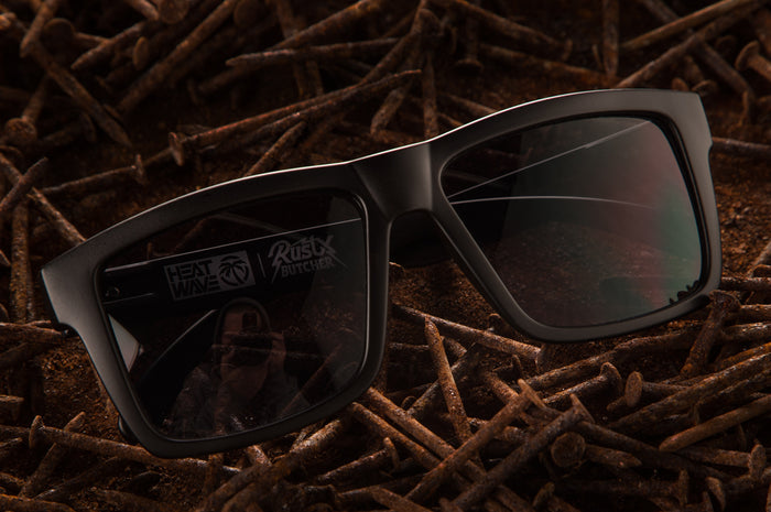 Heat Wave Visual Vise Sunglasses lying on a bed of rusty nails.