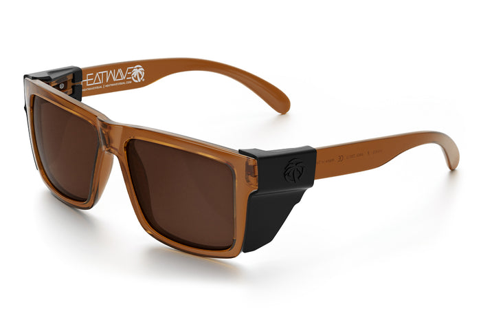 3/4 angle view of the VISE Sunglasses: Saddle with black side shields on a white background.