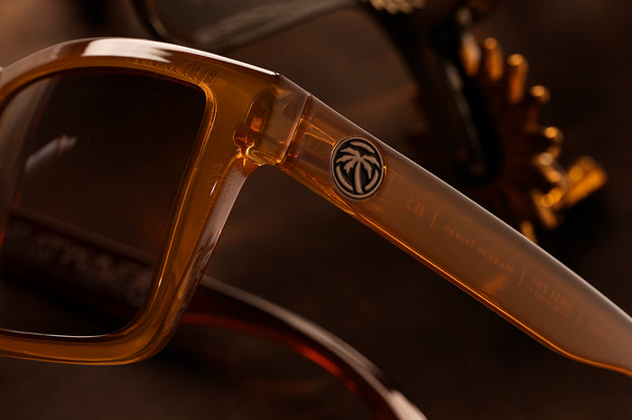 Close up shot of the VISE Sunglasses: Saddle Z87 on a wood table