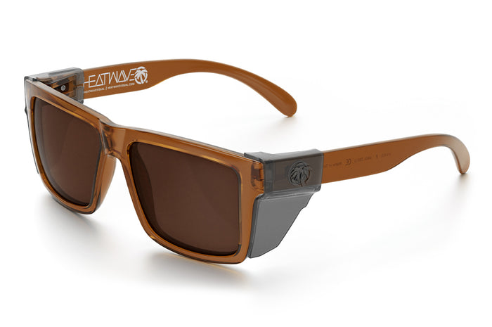 3/4 angle view of the VISE Sunglasses: Saddle with smoke side shields on a white background.